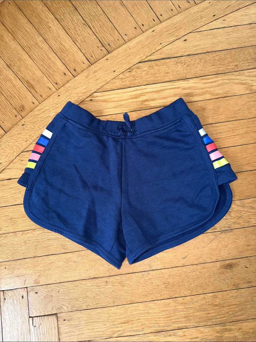 Girls Navy Athletic Shorts with Multicolor Side Stripes